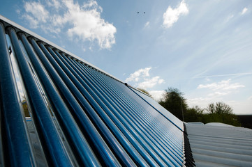 Closeup of vacuum tubes from solar water heating system.