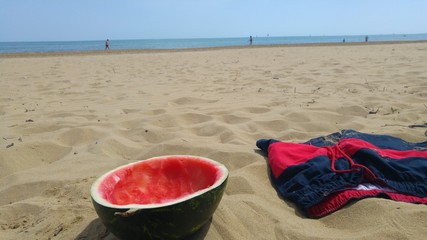 beach, swimming trunks and watermelon