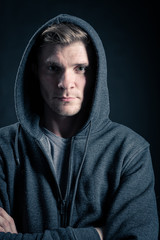 Fototapeta premium portrait of young man in hood