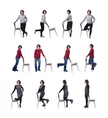 large group of woman playing with a chair in white background