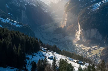 Fotobehang view from Wengen Lischboden over Lauterbrunnen Valley on a beautiful winter morning © schame87