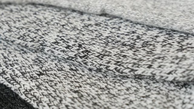 Knitted socks in different colors 4K panning video