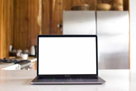 Laptop On A Modern Kitchen Counter Top