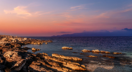 Beautiful landscape with bay. Sunny spring seascape of Ionian Sea with colorful sky during sunset. Wonderful summer day on the Emblisi beach. Kefalonia island, Greece, Europe. Amazing nature Scenery © jenyateua