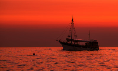 Boat. Sun. Orange. Sea. Sky. Istria