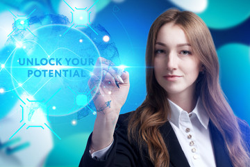 Business, Technology, Internet and network concept. Young businessman working on a virtual screen of the future and sees the inscription: Unlock your potential