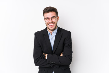 Young caucasian business man posing in a white background isolated Young caucasian business man laughing and having fun.