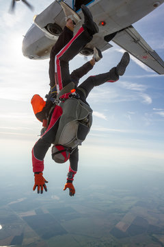 Tandem jump. The instructor and the student in free fall.