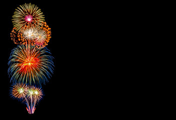 Fototapeta premium Beautiful fireworks on black background.