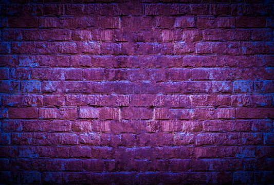 a neon brick wall glow with copy space mockup, grunge texture