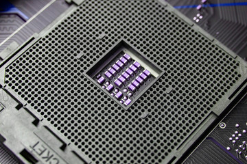 the macro view THe empty new computer socket on the motherboard for central processor or cpu