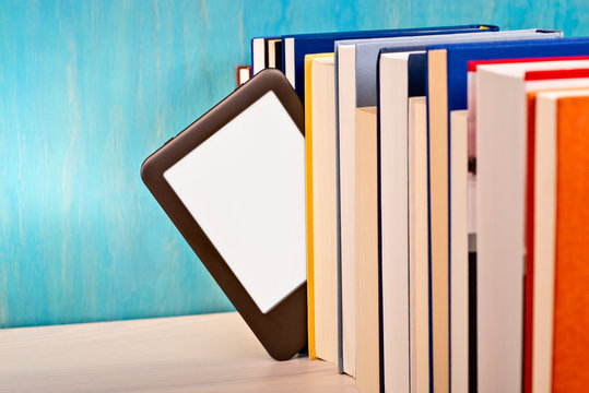 E-book reader between printed books