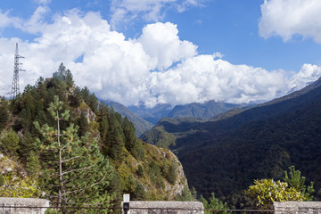 The road  passing through the mountains covered with forests in Svaneti in the mountainous part of Georgia