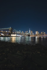 New York City Cityscape at Night taken with Long Exposure and Reflection in the River