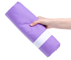 Purple folded bedsheet in hand on white background isolation