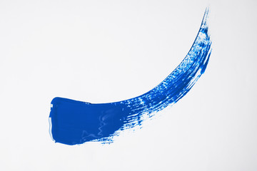 Paint stroke on white background background, top view. Color of the year 2020 (Classic blue)