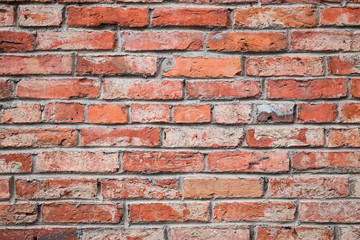 Countryside brick style old house orange wall.