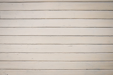 Old, white abstract house exterior wall from wood.