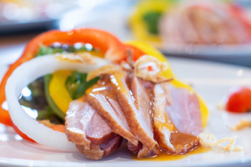 smoke duck slice salad on plate
