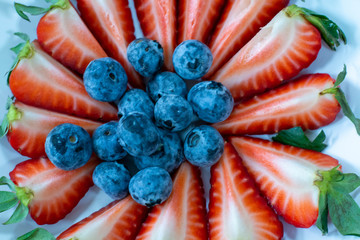  fresh strawberry and blueberry background