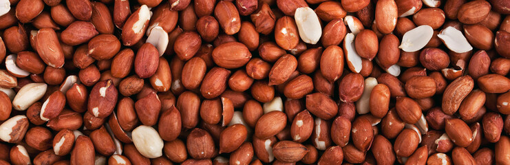 Peanut kernels, no shell, panorama, background, texture.