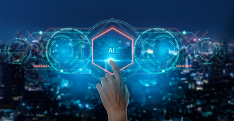 Hand touching CPU icon and hologram on city background.Artificial intelligence (AI) with machine deep learning and data mining and another modern computer technologies UI concept.