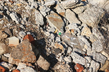 Construction waste with elements of various dismantled and destroyed old structures at municipal...