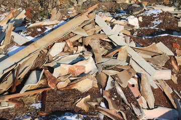 Construction waste with elements of various dismantled and destroyed old structures at municipal landfill