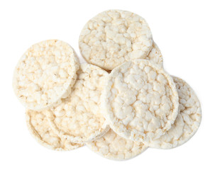 Pile of crunchy rice cakes isolated on white, top view