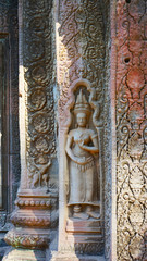 Stone rock carving art at Ta Prohm Temple in Angkor wat complex, Siem Reap Cambodia.