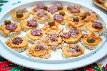 Italian appetizers on laid table
