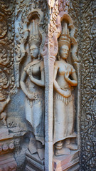 Stone rock carving art at Ta Prohm Temple in Angkor wat complex, Siem Reap Cambodia.