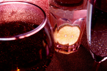 Glasses of drinks on sparkling background. Holiday party, celebration concept. Free space for text....