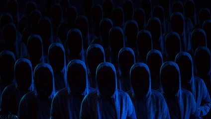 Dangerous hooded group of hackers. Internet, cyber crime, cyber attack, system breaking and malware...