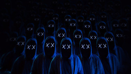 Masked hackers army. Dangerous hooded group of hackers. Internet, cyber crime, cyber attack, system breaking and malware concept. Dark face. Anonymous.