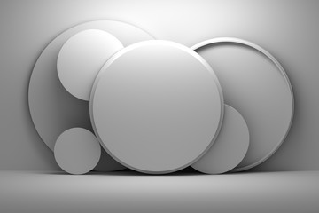 Presentation mock up with circular shapes standing next to wall in gray colors