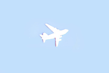 Happy Valentines day. Children's plane on a blue background with red heart