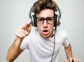Teenager caucasian man playing computer games