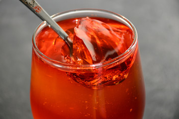 Glass cup with delicious fruit jelly.