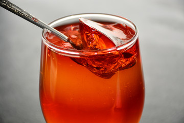 Glass cup with delicious fruit jelly.