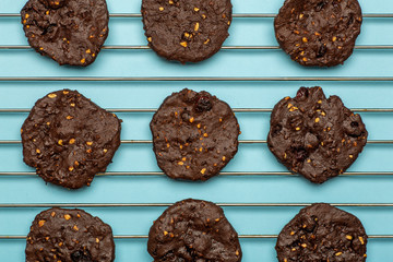Homemade gluten-free chocolate chip cookies with cereals, nuts and organic cocoa. Cookies and...