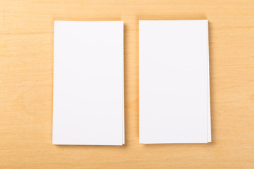 Photo of blank business cards on a general background. Template for identifier. View from above. mock up