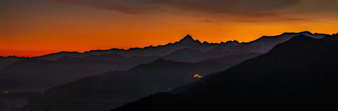 the Sacra di San Michele and Monviso: the two symbols of Piedmont aligned at sunset. Panorama