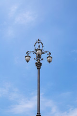 Fototapeta na wymiar Decorative street lamp in Trieste, Italy