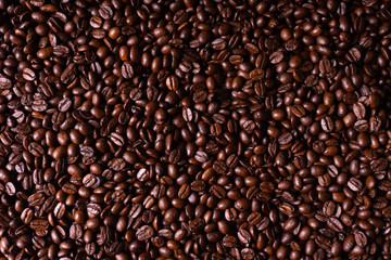 Close up of fresh roasted brown coffee beans