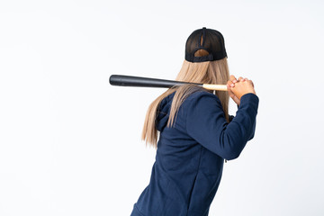 Young blonde woman playing baseball over isolated background
