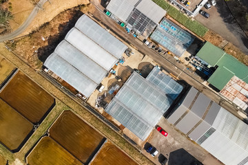 Cages for sturgeon fish farming in natural river or pond, aerial