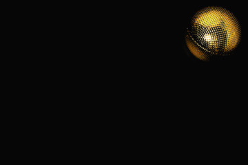 Golden decorative ball isolated on black background. Christmas backdrop. Celebration and party concept.