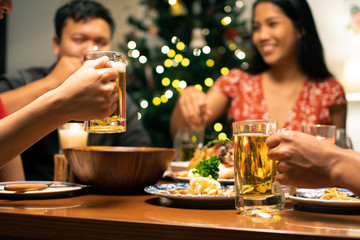 Asian groups are party dining and beer in the evening at home.