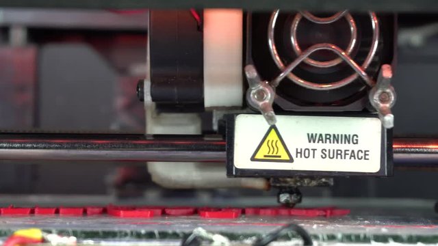 3D printer working. Fused deposition modeling, 3D printer printing an object from plastic. Automatic three dimensional 3d printer performs plastic. Progressive additive technology for 3d printing